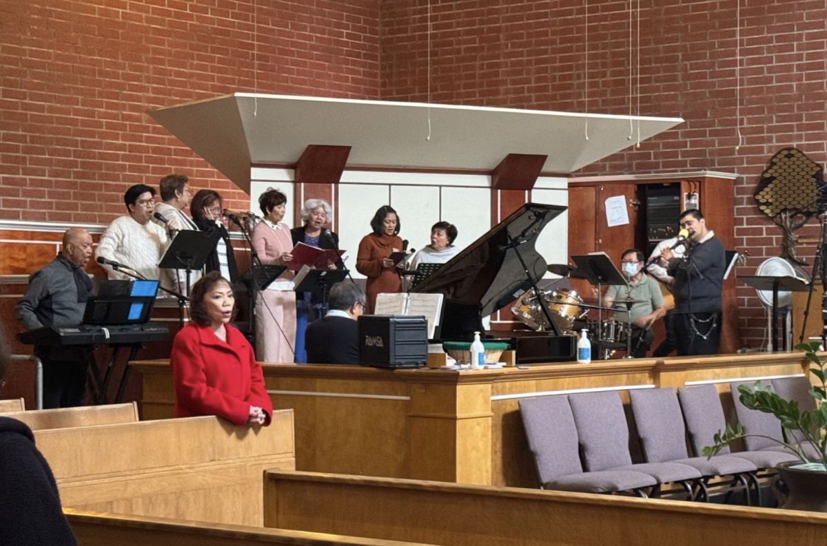 Rodette Deiresa (seventh from the left), Dennis Deiresa (pianist), and their fellow musicians lead the congregation in worship, invoking a desire to sway with the rhythm, tap your feet at the beat, sing the hymns, and clap along to the notes.
